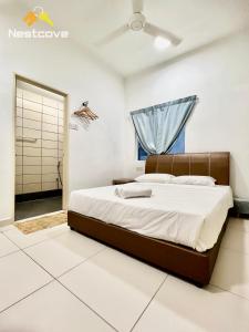 Voodi või voodid majutusasutuse The Hideaway Malacca Stay By Nestcove toas