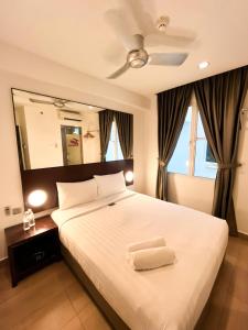 Krevet ili kreveti u jedinici u objektu Tune Hotel Georgetown Penang