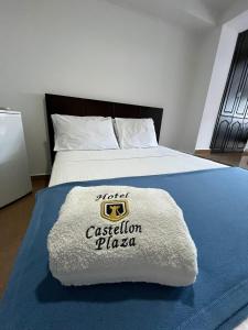 Rúm í herbergi á Hotel Castellón Plaza