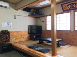 Televizorius ir (arba) pramogų centras apgyvendinimo įstaigoje Izakaya inn "Tsubaki" - Vacation STAY 14130