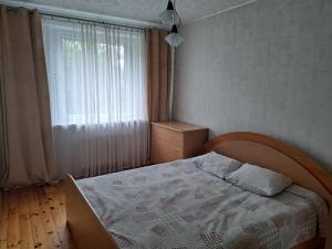 Кровать или кровати в номере Welcoming apartment