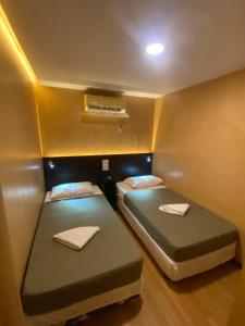 Tempat tidur dalam kamar di Hostel Asilda