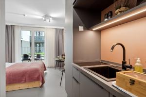 Kuhinja ili čajna kuhinja u objektu Arbio I Rooms & Apartments Freiburg