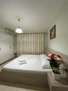 Cama ou camas em um quarto em NEO Apartments