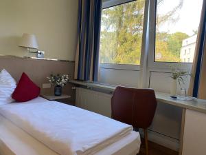 Krevet ili kreveti u jedinici u objektu NP Hotel Novalis Dresden