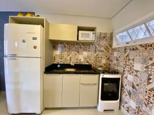 Dapur atau dapur kecil di Ondas do Mar Residencial