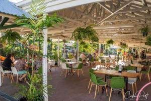 Un restaurante u otro lugar para comer en Cairns Colonial Club Resort