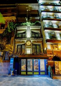 a building with balconies on the side of it at Sometimes Hotel Taksim in Istanbul