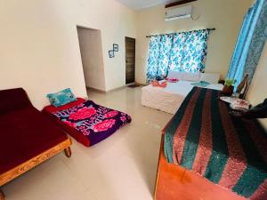 Кровать или кровати в номере Happy Home Varkala