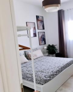 Lova arba lovos apgyvendinimo įstaigoje Elsa Holiday Home