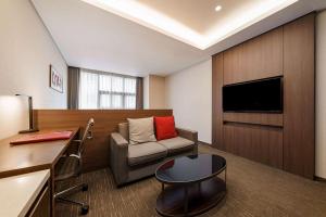 Телевизия и/или развлекателен център в Ramada Encore by Wyndham Busan Station