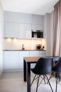 Una cocina o kitchenette en VISIONAPARTMENTS Lugano