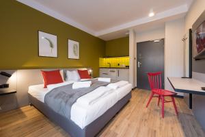 Ліжко або ліжка в номері Aparthouse Woźna 11 Old Town