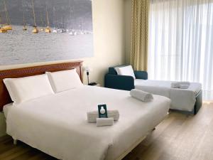 B&B Hotel Affi - Lago di Garda में एक कमरे में एक या कई बेड