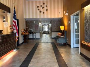 Lobby o reception area sa Express Inn Leesville Ft Johnson, SureStay Collection by Best Western