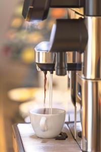 Coffee at tea making facilities sa Villa Hubertus Luxuria Nova Suites - Adults friendly