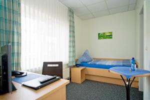 A bed or beds in a room at Köhler's Hof