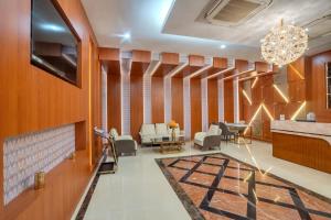 Телевизор и/или развлекательный центр в Park Avenue Hotel & Apartments Trichy