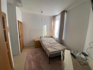 Ліжко або ліжка в номері Apartamenty Arkuszowa 58