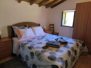 Una cama o camas en una habitación de Casa da Esperança