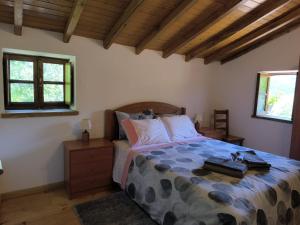 Una cama o camas en una habitación de Casa da Esperança