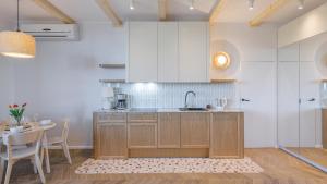 Apartamenty Sun & Snow Bursztynowa Rewa 주방 또는 간이 주방