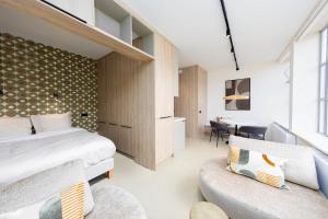 Giường trong phòng chung tại StayIn - Ede