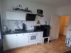 Dapur atau dapur kecil di Fußball-Kultur Appartement Gelsenkirchen Schalke