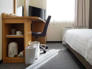 Krevet ili kreveti u jedinici u okviru objekta Comfort Hotel Gifu