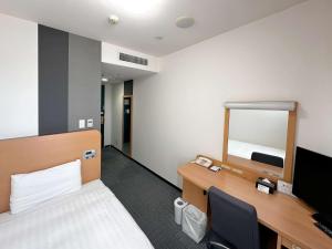 Krevet ili kreveti u jedinici u okviru objekta Comfort Hotel Gifu