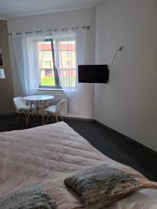 Postelja oz. postelje v sobi nastanitve Apartament Maja