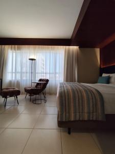 Vuode tai vuoteita majoituspaikassa Quality Hotel & Suítes São Salvador