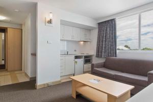 A kitchen or kitchenette at Metro Hotel Perth