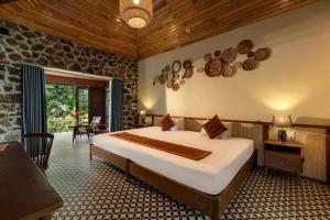 Кровать или кровати в номере Nature Garden Ecolodge Ninh Bình