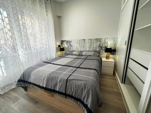 A bed or beds in a room at Apartamento amoblado en el centro de Madrid