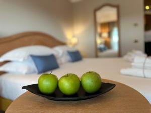 Cama ou camas em um quarto em Palace Hotel Wellness & SPA