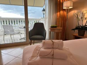 Cama ou camas em um quarto em Palace Hotel Wellness & SPA