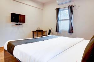 TV/trung tâm giải trí tại Super Hotel O Bopodi Near Pune IT Park