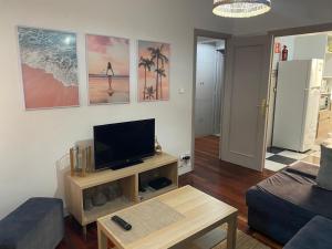 TV i/ili multimedijalni sistem u objektu Appartement avec terrasse