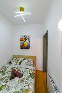 Ένα ή περισσότερα κρεβάτια σε δωμάτιο στο Apartament POD WIEŻĄ 2