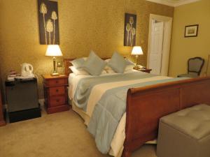 Cama ou camas em um quarto em Brook Manor Lodge