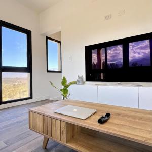 Et tv og/eller underholdning på Lo de Nieves - Casas con hermosa vista al Nevado y gran ubicación