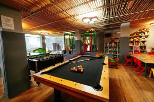 a billiard room with a pool table in it at Hotel Agit Congress&Spa in Lublin