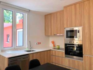 Una cocina o kitchenette en Casa Nêspera