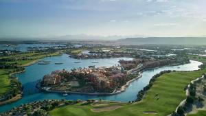 an aerial view of a golf course and a river at Steigenberger Golf Resort El Gouna in Hurghada