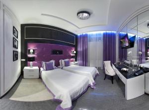 Posteľ alebo postele v izbe v ubytovaní Mirax Boutique Hotel