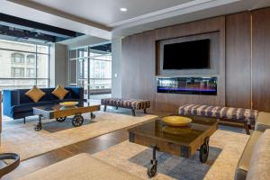 A television and/or entertainment centre at Cambria Hotel Downtown Asheville