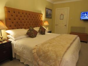 Cama ou camas em um quarto em Brook Manor Lodge