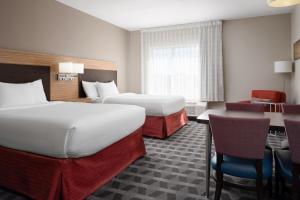 Krevet ili kreveti u jedinici u objektu TownePlace Suites by Marriott Lafayette South