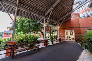 a building with benches in front of a building at Kellogg Conference Hotel Capitol Hill at Gallaudet University in Washington